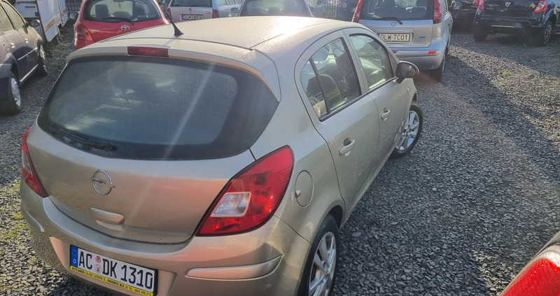 Opel Corsa cena 12800 przebieg: 120300, rok produkcji 2009 z Dąbrowa Tarnowska małe 106